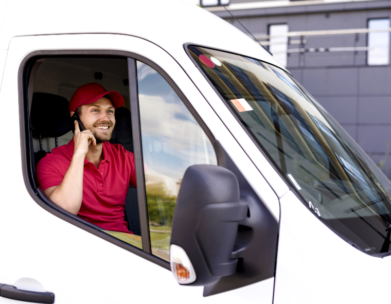 high-angle-delivery-service-man-talking-phone